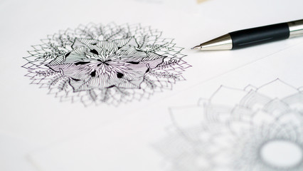 artist desk top view pen, pencil mandala flower floral hand drawing design illustration