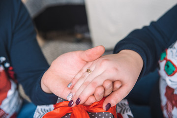 Man and woman holding each other's hands