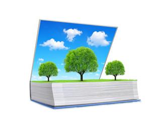 Open book of nature with trees on meadow and blue sky isolated on white background. Ecological concept.