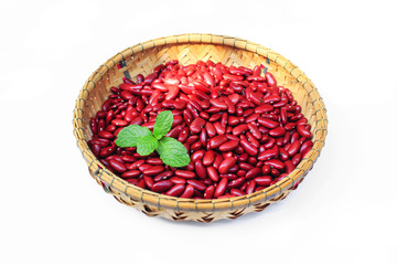 Red kidney bean on rattan cup on  white background