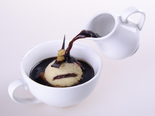 Pouring Coffee into a cup.