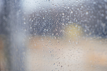 Drops of rain on glass