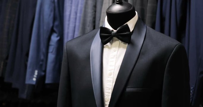 Stylish men's suit. Men's jacket on a mannequin. Men's Clothing. Clothing store. Shopping in boutiques.
