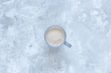 Cup of cocoa on concrete background