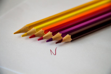 Сolored pencils on a white background