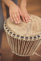 Playing the bongo drum