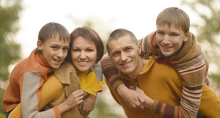Family in autumn park