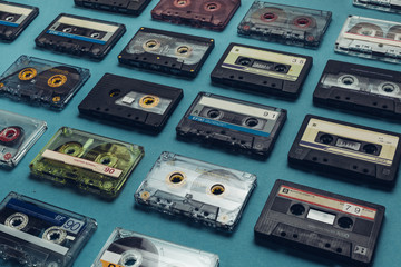 Collection Of Retro Audio Tapes On Blue Background. Creativity Concept