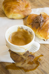 leftovers of espresso coffee and chocolate horn