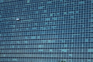 detail of the glass front of a building