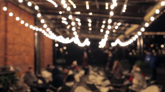 blurry nighttime cafe