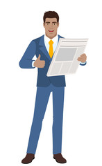 Businessman with newspaper showing thumb up