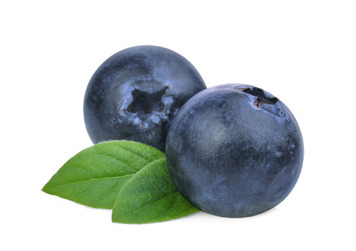 blueberries with green leaves isolated on white background