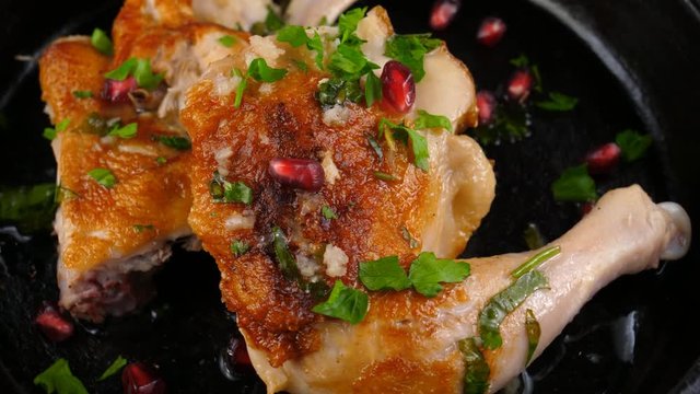 Pan fried chicken Tabaka style, with garnet seeds and parsley, dish served in Georgian or Caucasus Restaurants, loop, 4K, ProRes codec, 422 HQ