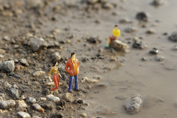 Fototapeta premium Miniature figures on the ground