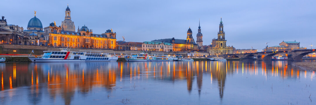 Dresden Cathedral of the Holy Trinity or Hofkirche, Bruehl's Terrace or The Balcony of Europe, Semperoper and Augustus Bridge with reflections in the river Elbe in Dresden, Saxony, Germany