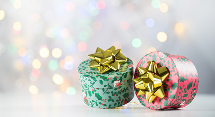 christmas decoration on bright background, gift boxes and tree