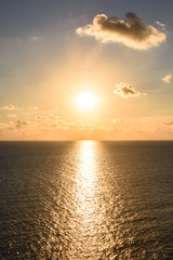 Nice sunset on the beach, with the orange sky.