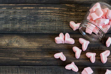 Heart of marshmallows in a glass jar