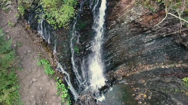 Aerial shoot of beautiful places in carpathian mountains. Waterfall Zhenetskyi Huk , Ukraine
