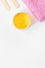 concept depilation with wax on white background top view