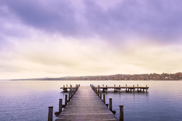 Obraz premium Empty wooden pier on Lake Starnberg in Bavaria, Germany