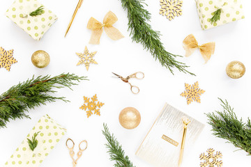 Holiday round frame, pattern made and gold glass Christmas balls, golden leaves isolated on a white background. Merry Christmas. The apartment lay, top view