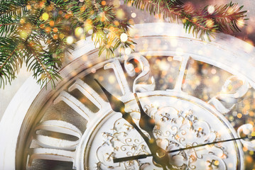 Happy New Year at midnight 2018, Old wooden clock and fir branches