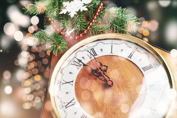 New Year's Clock. Old watches and Christmas decorations. Concept of New Year and Christmas.