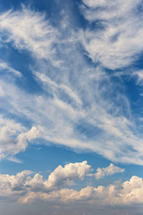 a beautiful blue sky day with white clouds as background