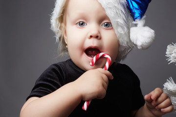 happy child in christmas with sweet gift