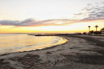 Obraz premium Sunset on the beach in Santa Pola, Alicante Spain