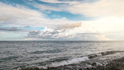 magical sunset in the coast of bali. amed. indonesia