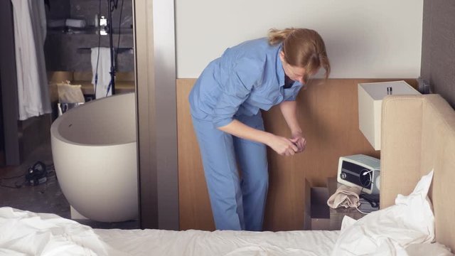 the maid steals money while cleaning the room in a five-star hotel. 4k.