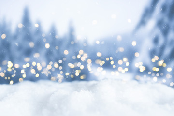 snowy winter christmas bokeh background with circular lights and trees - obrazy, fototapety, plakaty