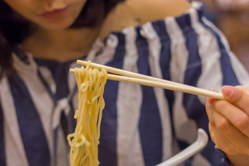 noodle ramen with traditional japanese ate by woman