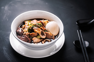 Paste of rice flour or Boiled Chinese pasta square, Chinese roll noodle soup.