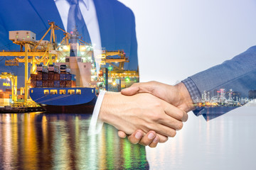 Double Exposure of a businessman handshake on the container,container ship in import export and business logistic,By crane ,Trade Port , Shipping,cargo to harbor background.
