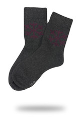 woolen socks with a winter pattern isolated on white