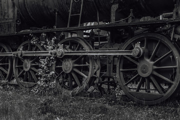 Fototapeta na wymiar Driving wheels from an old steam locomotive