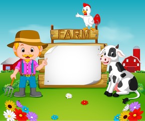 Fototapeta premium farmer with a blank wooden sign