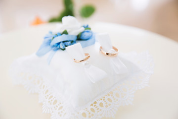 Engagement gold rings on the stand for rings
