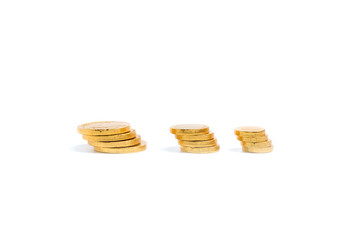 Pile stacked of golden coins on isolated white bakcground,financial concept