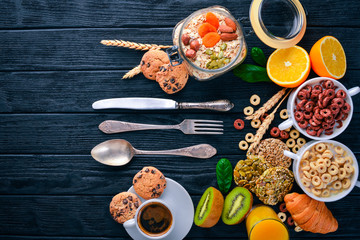 Breakfast served with coffee, orange juice, croissants, cereals and fruits. Balanced diet.