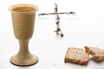 Chalice Of Wine With Bread On The Table