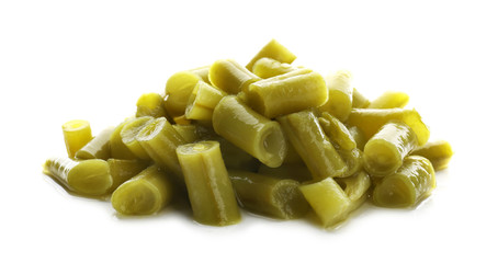 Heap of canned green beans on white background
