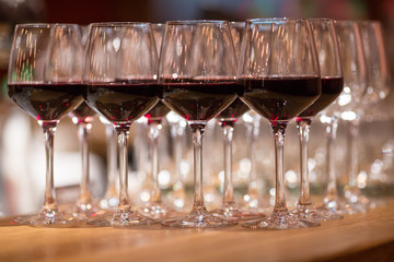 Wine glasses inwarm light  loft restaurant