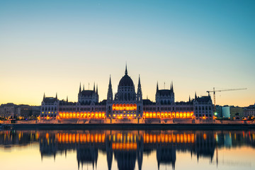 Fototapeta na wymiar Morning view of illuminated Parliament building in Budapest, Hungary
