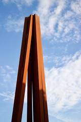 Metal sculpture in French town of Nice / Vertical iron beams in a cone shape
