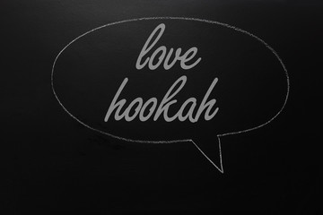 Text drawn on blackboard: Love hookah